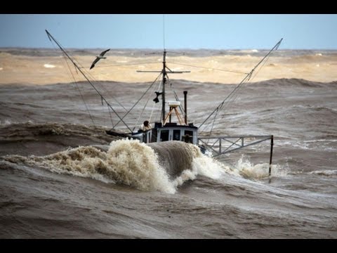 Incredible video —  fishing boats in rough sea